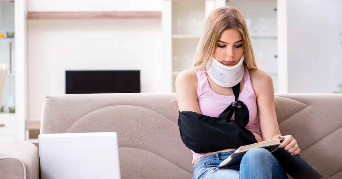 An injured woman on a couch